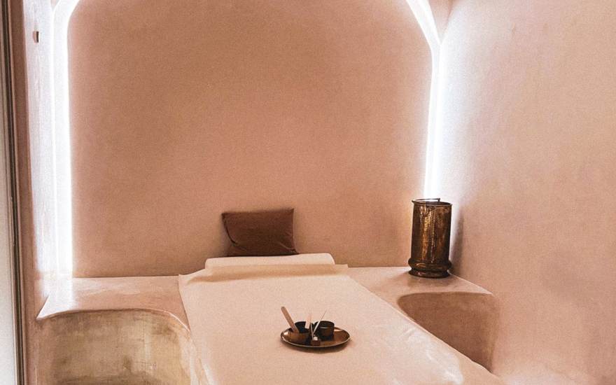 Web design for health and wellness businesses, shown with a spa treatment room