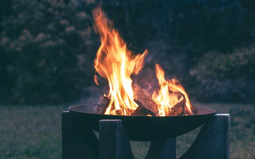Web design for landscaping and outdoor businesses, shown with a backyard fire pit